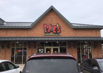 Moe's old sign