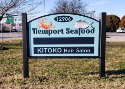 Outdoor sign for Newport Seafood