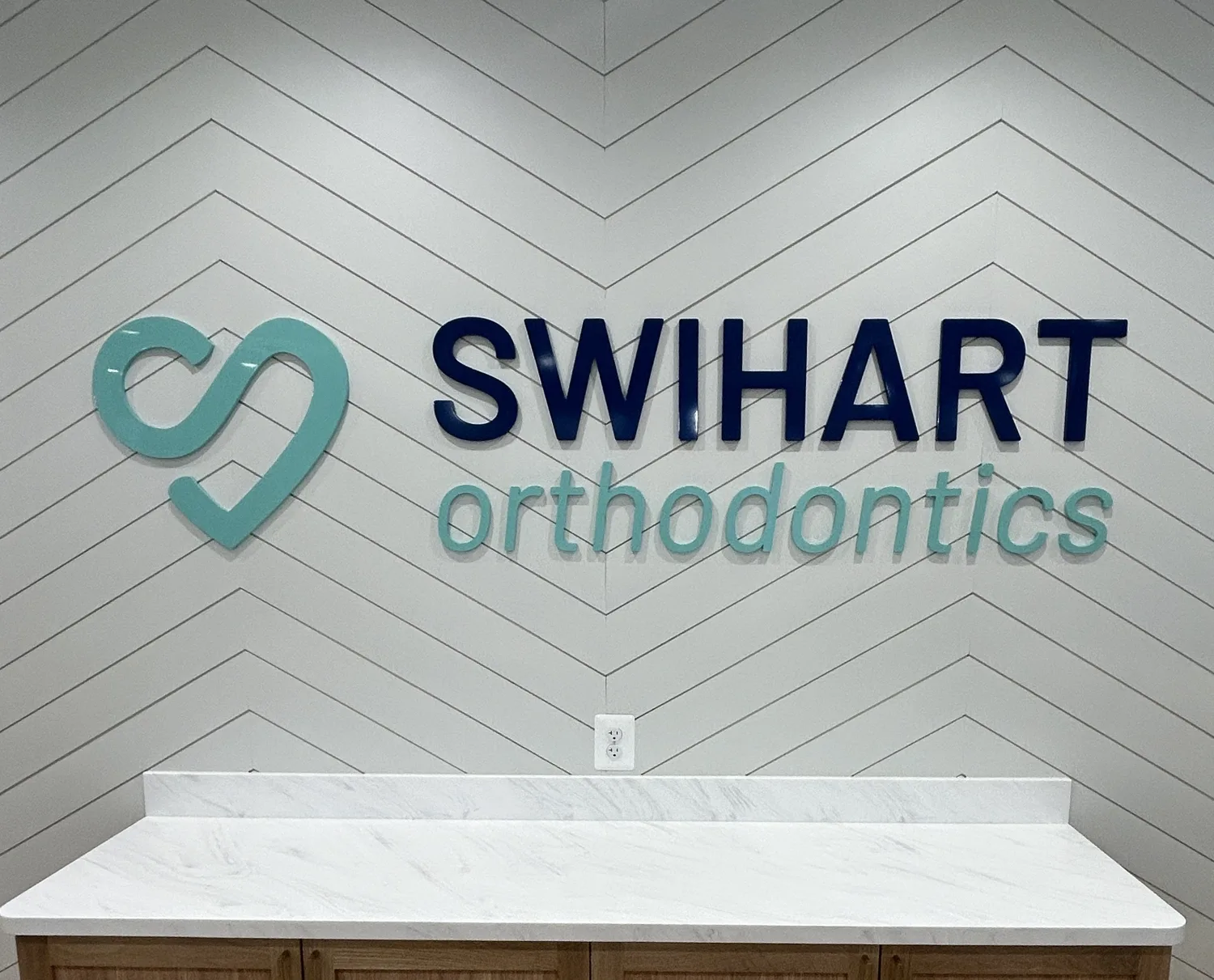 Custom dimensional metal letters fabricated and installed by James River Signs